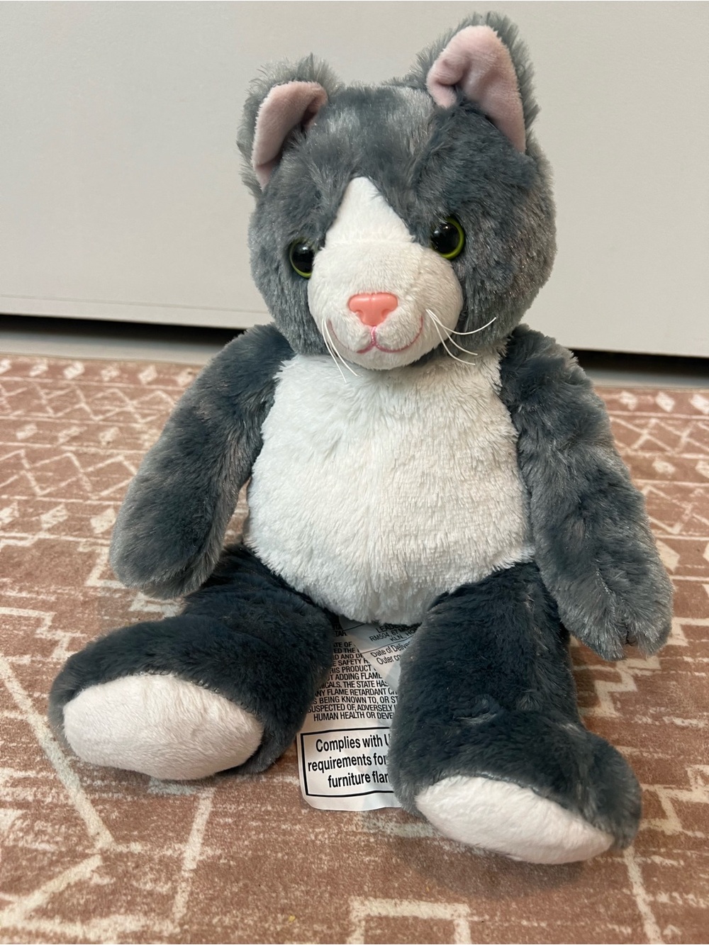 Health Touch Huggable Massager plush Gray & White Stuffed Toy (not for pets)